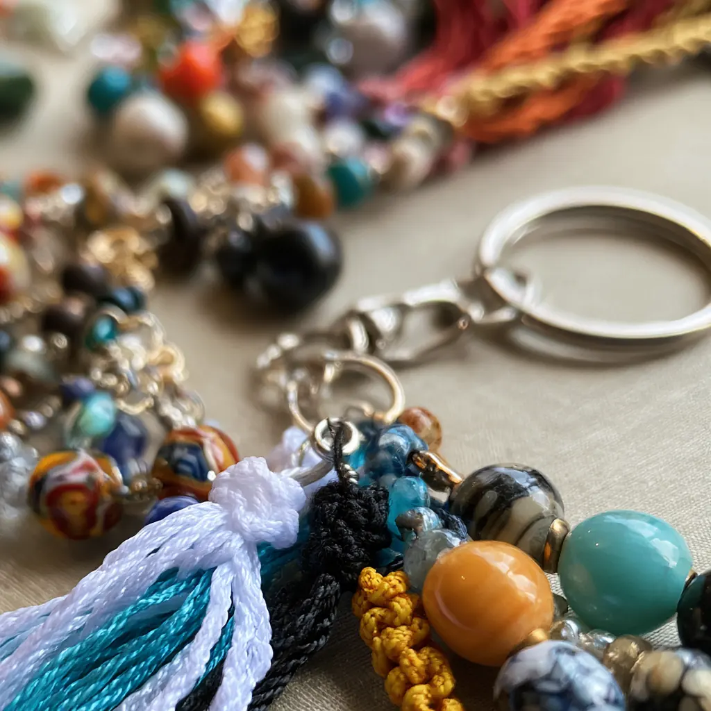Beaded charms with white tassels